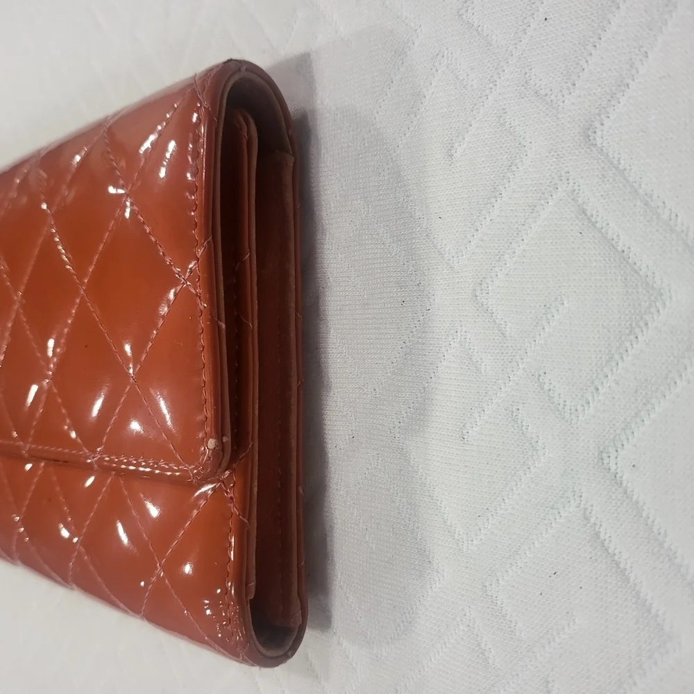CHANEL Quilted Orange Matelasse Gold CC Logo Patent Leather Long Bifold Wallet.
